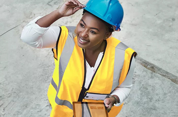 Black woman on building site 